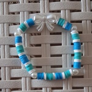 Blue and White Clay Beaded Bracelet with Bow